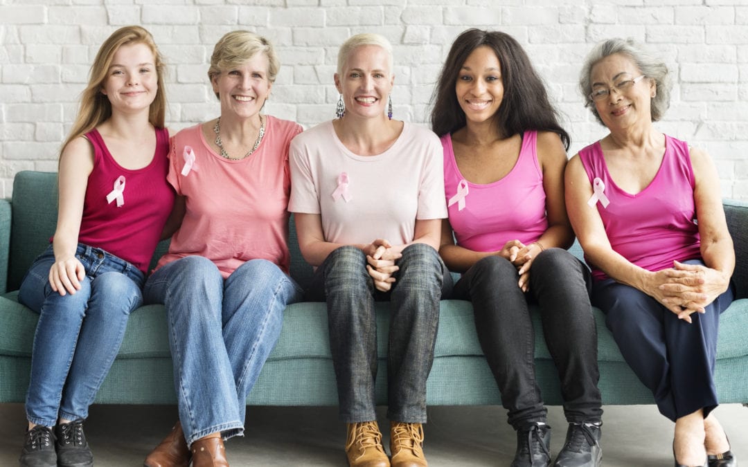 Women affected by breast cancer wearing pink.