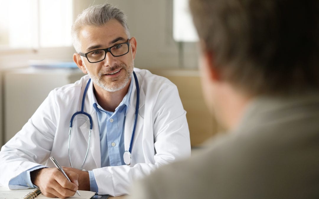 Doctor speaking to patient about colorectal cancer